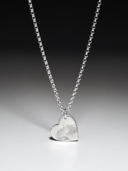 Silver necklace with a small heart pendant with a noseprint